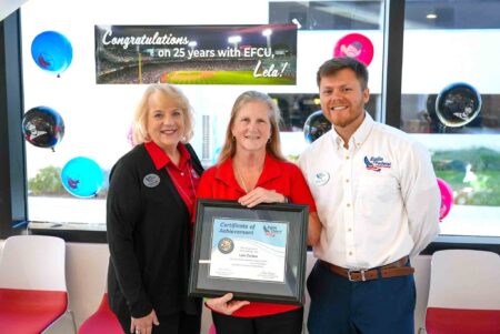 Eglin Federal Credit Union leaders celebrate Lela Corlew’s 25 years of service.