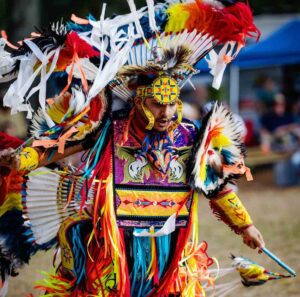 Drums, dance, and heritage fill the weekend at Niceville powwow Alt Text: A Native American dancer in full regalia performs at the Thunderbird Intertribal Powwow in Niceville, Florida.