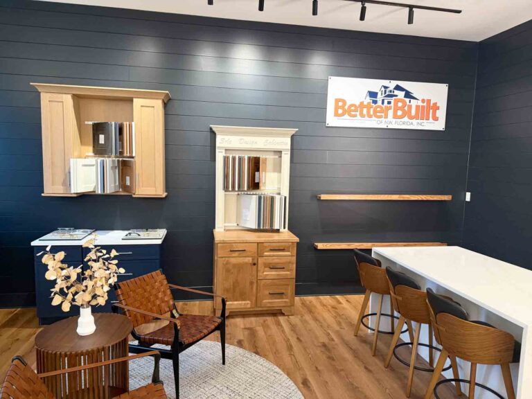 Interior view of the BetterBuilt Design & Sales Center showing cabinetry samples, seating, and a design counter.