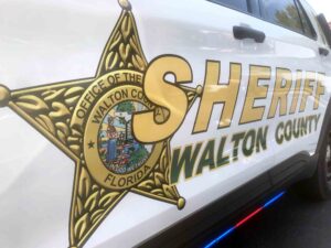 Walton County Sheriff’s Office badge and lettering on the side of a patrol vehicle.