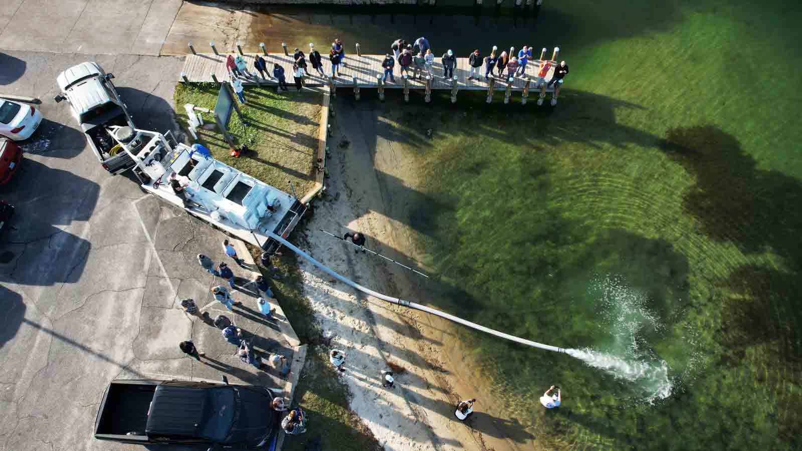 Aerial view of redfish release into Cinco Bayou in Okaloosa County