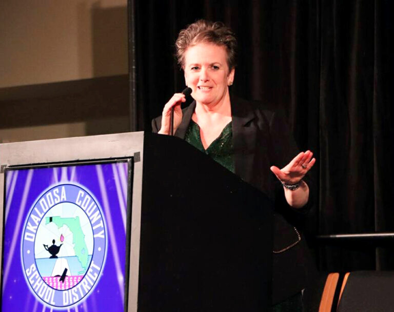 Kenwood Elementary teacher named OCSD’s 2027 Teacher of the Year Kimberly Day-Scanlon speaks at the podium during the Okaloosa County School District Teacher of the Year celebration.