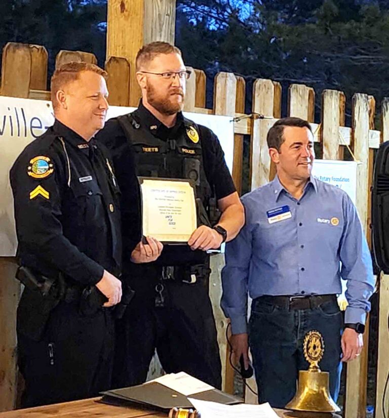 Niceville corporal earns Rotary Officer of the Year honor Corporal Christopher Forrester receives Officer of the Year award from the Niceville-Valparaiso Rotary Club while standing with fellow officers and a Rotary representative.