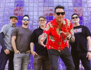 Members of Smash Mouth pose together during a promotional band photo.