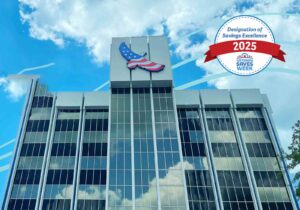 Eglin Federal Credit Union building with 2025 Designation of Savings Excellence award graphic