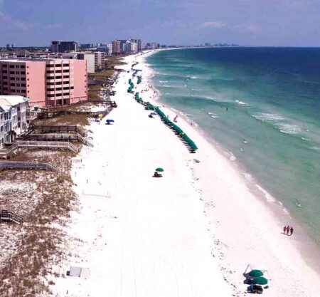 $10M project to rebuild Destin beaches to begin Aerial view of Destin shoreline with white sand beaches, turquoise water, and beachfront condos