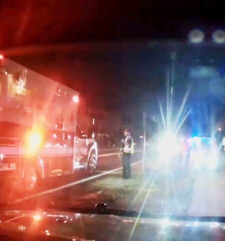 Emergency responders at the scene of a nighttime crash involving a low-speed vehicle on 30A in Walton County.