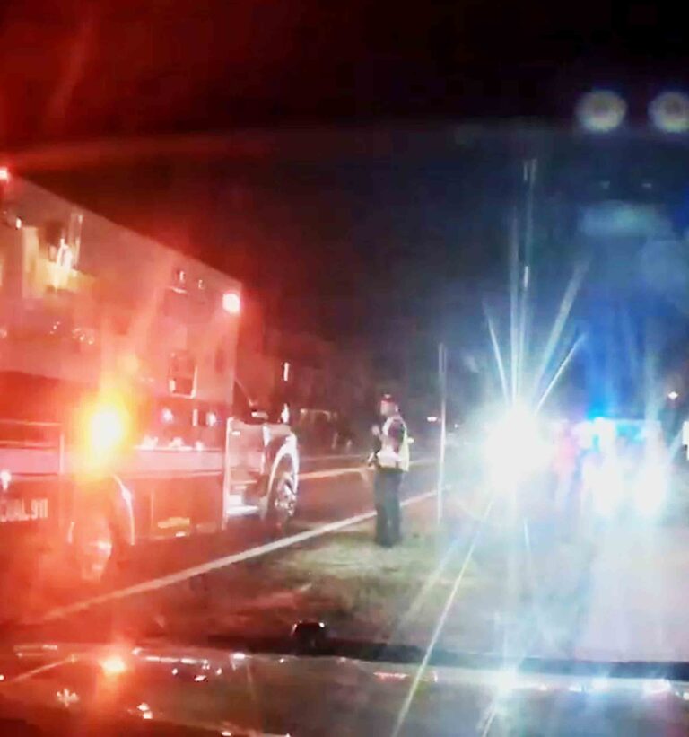 Emergency responders at the scene of a nighttime crash involving a low-speed vehicle on 30A in Walton County.