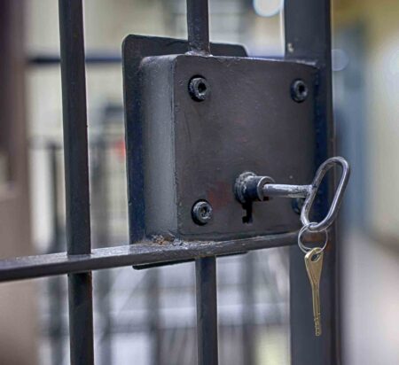 Close-up of a lock with a key inserted