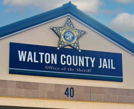 Walton County Jail building exterior with sheriff’s office sign