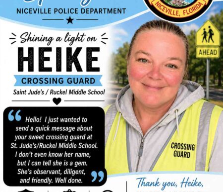 Niceville crossing guard Heike Noonkester stands in uniform during a Niceville Police Department Employee Spotlight feature.