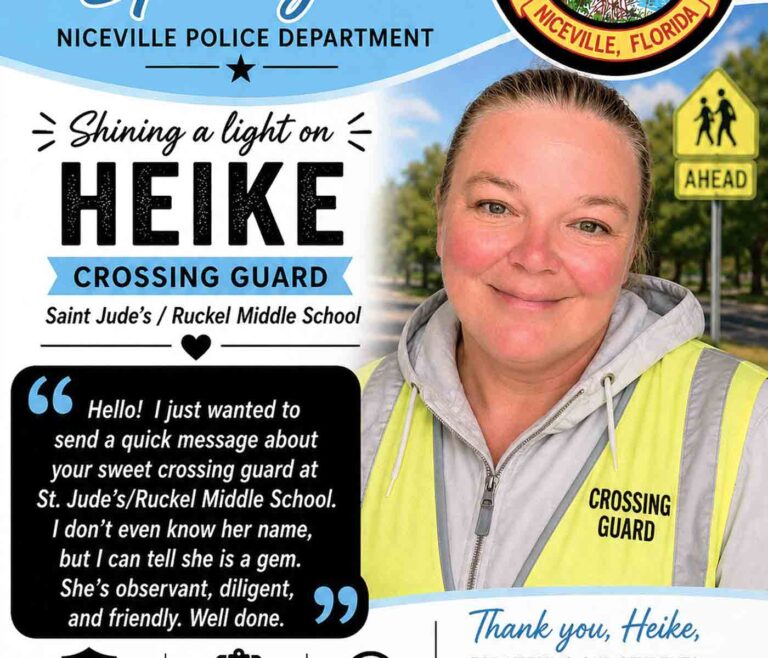 Niceville crossing guard Heike Noonkester stands in uniform during a Niceville Police Department Employee Spotlight feature.