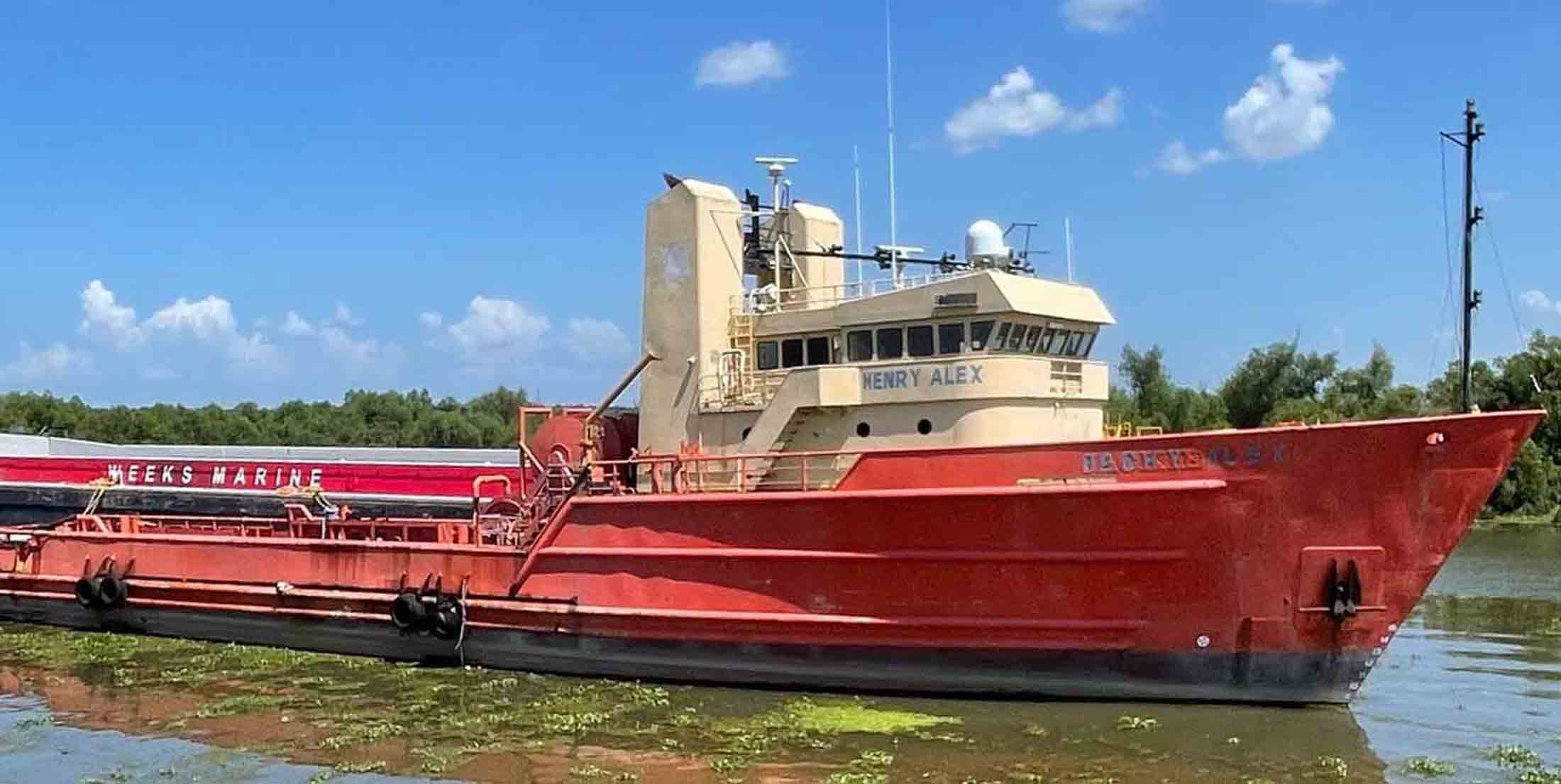 The 224-foot Henry Alex vessel sits moored at a dock before its planned deployment as the Sposit Reef, a new artificial reef in the Gulf.