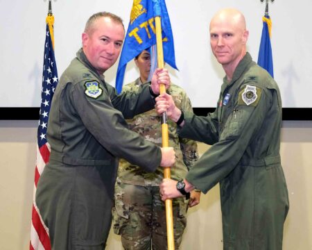 505th Test and Training Group welcomes new commander U.S. Air Force Col. Ryan Hayde, left, passes the 505th Test and Training Group guidon to Col. William Gery during a change of command ceremony at Hurlburt Field on July 2, 2026.
