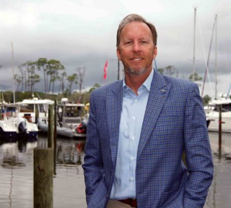 Hinely, Evanchyk win Okaloosa County School Board races Brett Hinely stands at a marina in Bluewater Bay.
