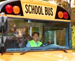 Okaloosa County 2026–27 school calendar, holidays, breaks School bus driver seated behind the wheel of a yellow school bus.