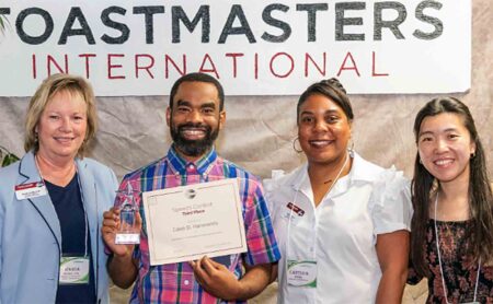 Finding their voice: Niceville club helps speakers build confidence Caleb D. Hammonds holds his third-place award at the Toastmasters District 77 Humorous Speech Contest in May 2026.