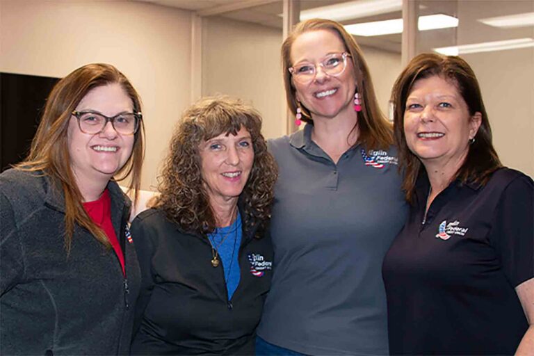 Eglin Federal Credit Union employees Amanda Lewis-Hendrickson, Dawn Oravetz, Jamie Cervantes and Alicia Kennedy gather for a photo celebrating Cervantes' Five-Star Performer Award for the third quarter of 2026.